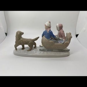 Figurine Dog Pulling Sled with Children Collectible Porcelain by paul sebastian